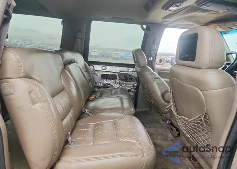 1999 Chevrolet Suburban C1500 from USA, damaged, VIN 3GNEC16R0XG216372